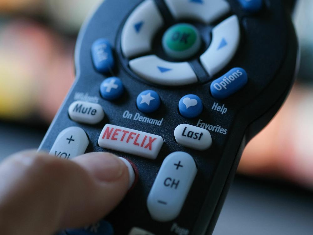 Netflix announced steady growth in its Q2 2023 earnings report. Above, the Netflix logo appears on a TV remote in July 2022.