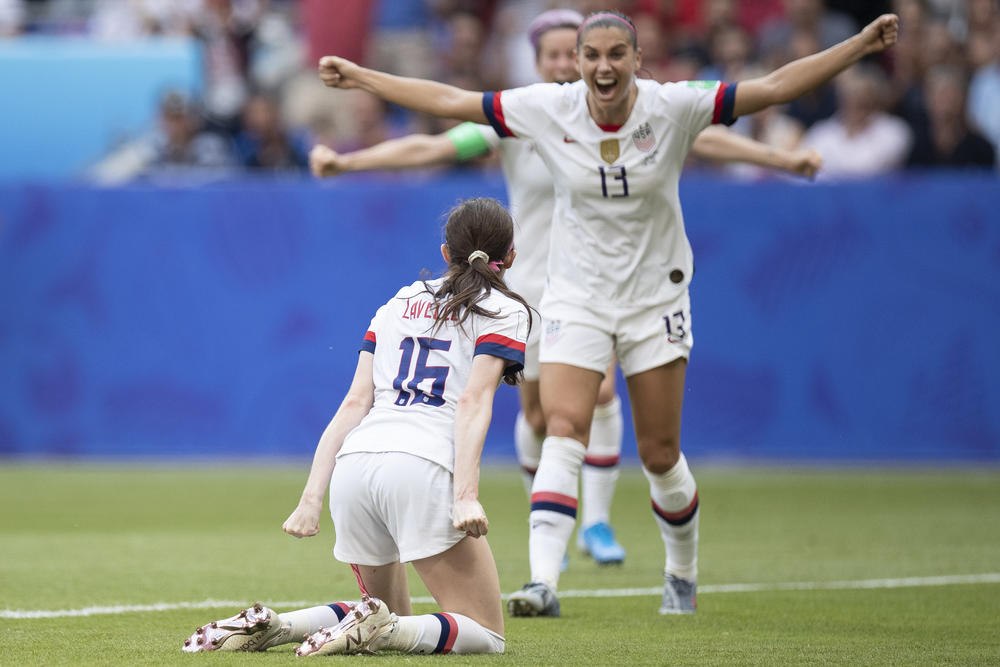 Rose Lavelle celebrates with Alex Morgan and Megan Rapinoe after scoring during the 2019 Women's World Cup final match. All three are back on the American squad this time.