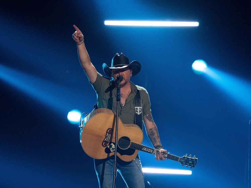 Country music singer Jason Aldean, pictured here performing at the Academy of Country Music Awards in Frisco, Texas in May, is facing a mixed bag of backlash and praise for a new music video that openly alludes to vigilante justice.