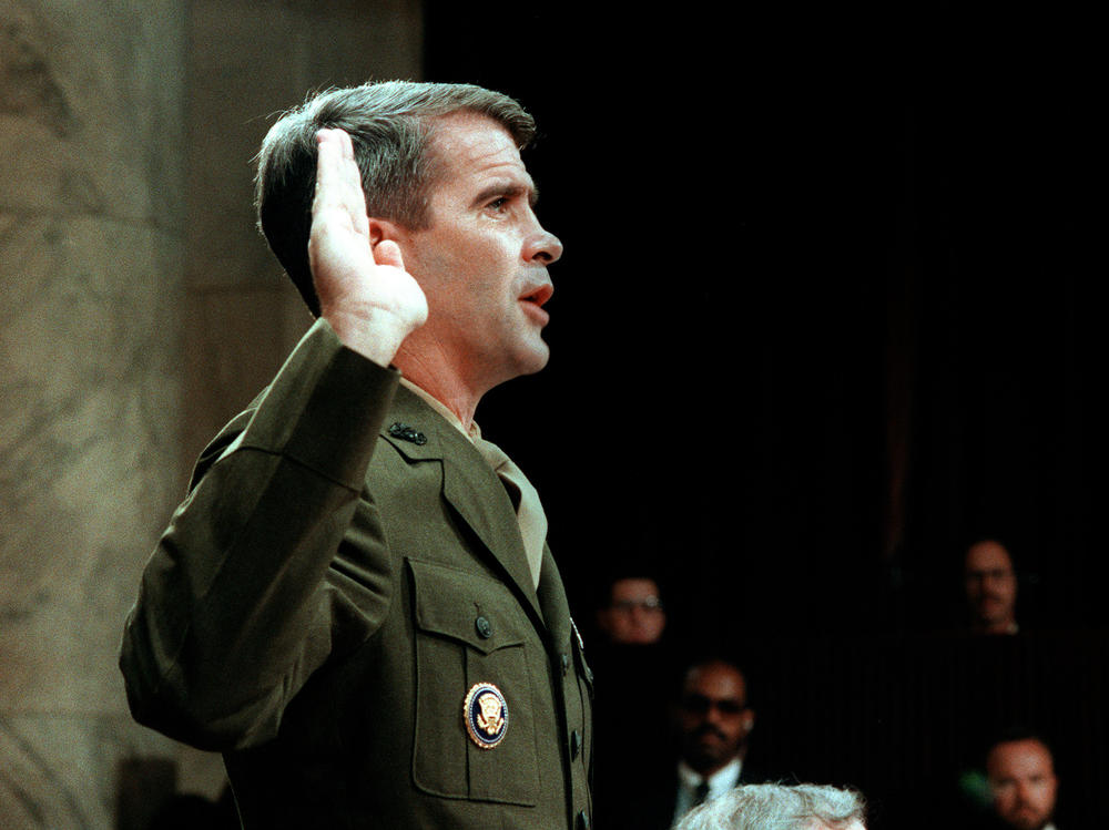 Lieutenant-Colonel Oliver North, is sworn in July 7, 1987 before the House and Senate Foreign Affairs Committee hearing in Washington, D.C. on the Iran-Contra Affair