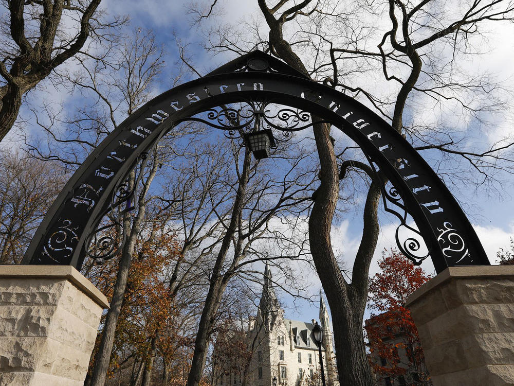 A former volleyball player has filed a lawsuit alleging hazing took place within Northwestern University's women's volleyball team. The Weber Arch at Northwestern University is pictured in 2020, in Evanston, Ill.