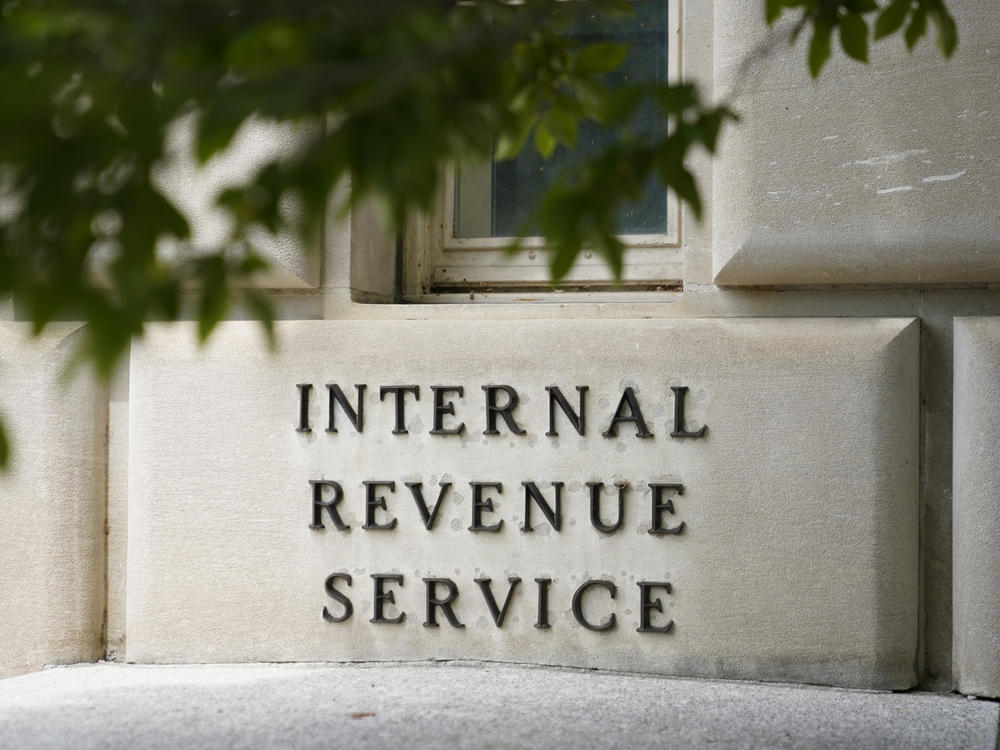 A sign outside the Internal Revenue Service building in Washington, on May 4, 2021. Effective immediately, the Internal Revenue Service will end its decades-old policy of making unannounced home and business visits — in a nod to worker safety and combatting scammers who pose as IRS agents.