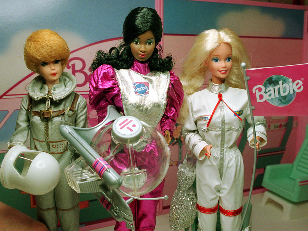 Astronaut Barbie dolls (from left) from the 1960s, 1980s and 1990s on display at the Smithsonian's National Air and Space Museum in 1995.