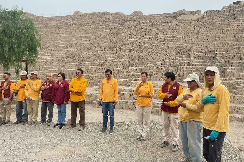 Tour guides gather at the Pucllana pyramid, located in a business district of Lima. Pucllana is one of the few ancient sites in Peru's capital that can be visited by tourists, who arrive by the  thousands every year.