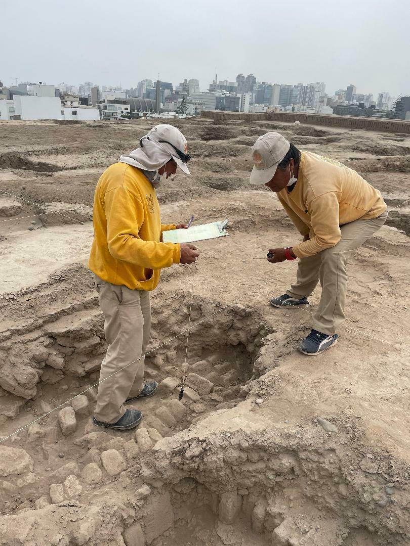 Workers excavate part of the Pucllana pyramid.