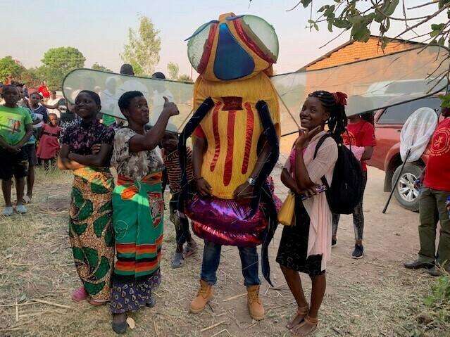 Don't worry, this six-foot-tall tsetse fly didn't bite anyone. He was part of a performance to teach Malawians about preventing sleeping sickness.