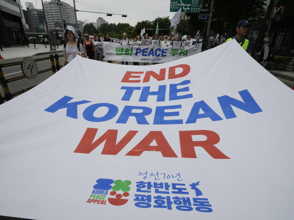 Participants march in Seoul, South Korea, during a July 22 rally commemorating the 70th anniversary of the Korean Armistice Agreement. This year's anniversary was marked with a characteristically martial parade in North Korea — attended by Russian and Chinese delegations — and in South Korea by inviting veterans of the Korean War to honor the fallen.