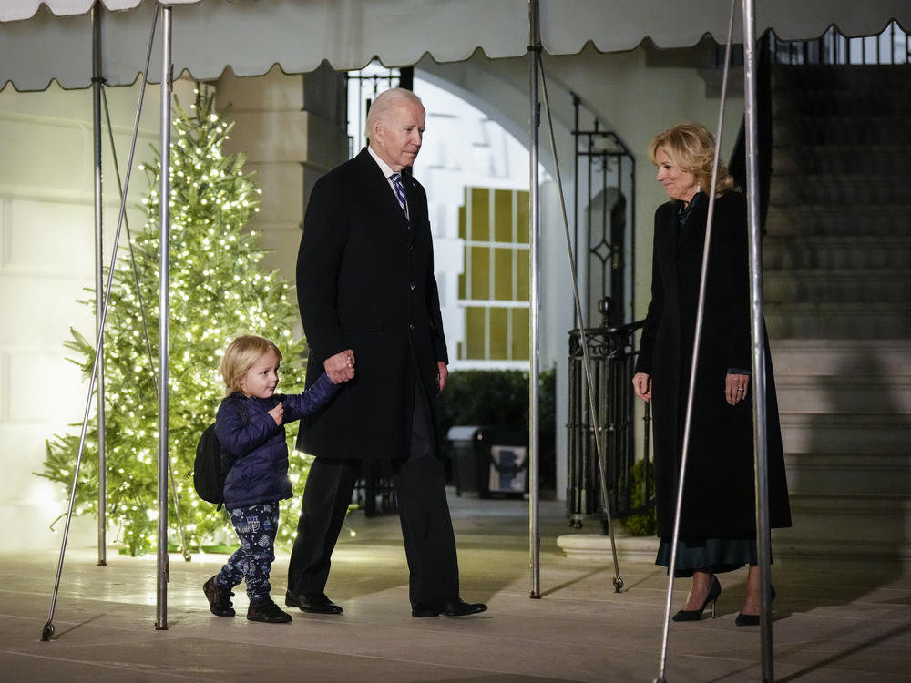 President Biden walks with his grandson Beau Biden as they leave the White House on December 16, 2022.