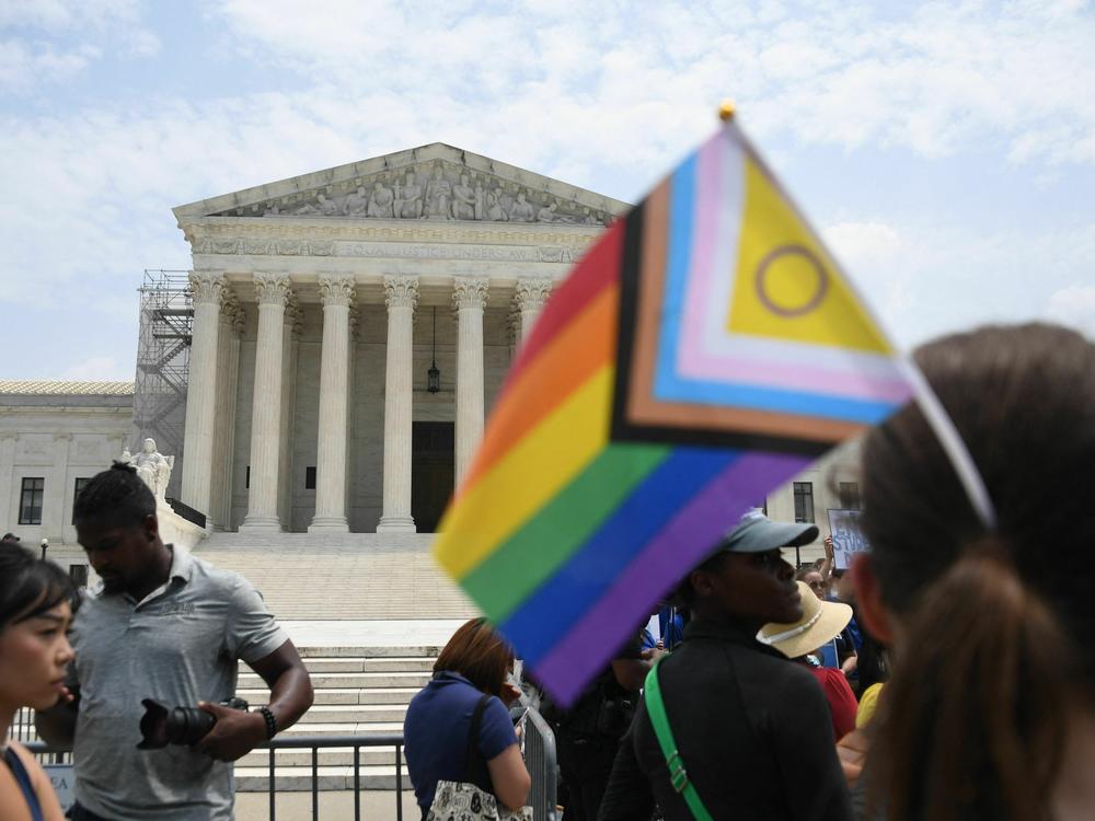 Gender rights activists demonstrate outside the U.S. Supreme Court on June 30, 2023, in Washington, D.C. Many of the bans states passed this year against gender-affirming health care for youth are in federal court and may be on their way to the U.S. Supreme Court.