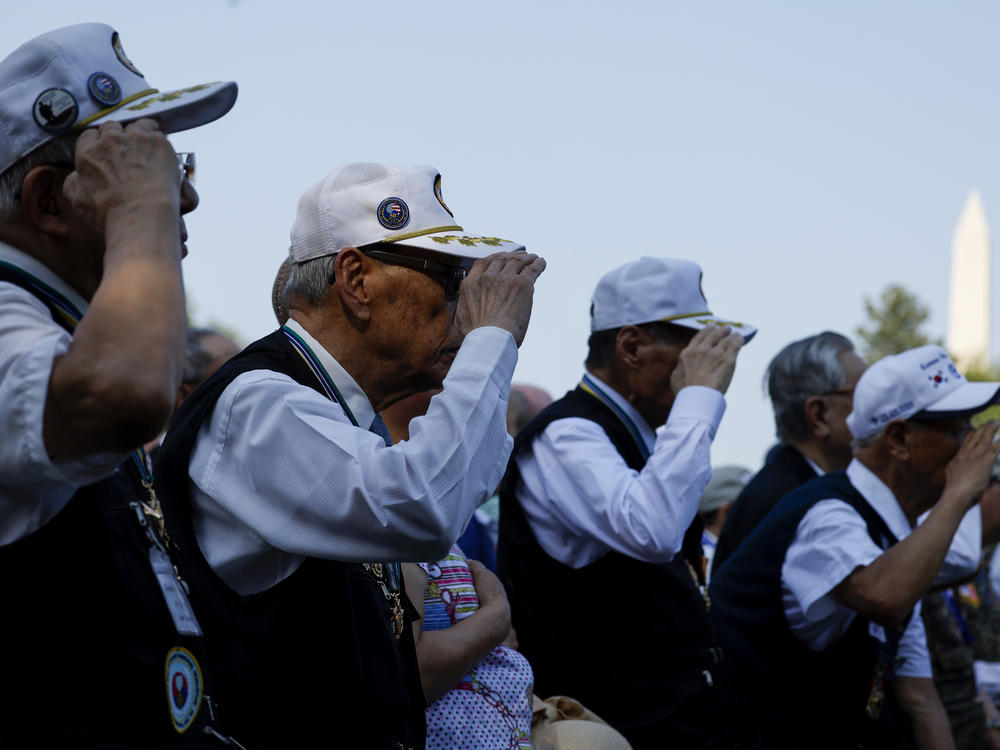 Korean War veterans from the Republic of Korea salute at a ceremony Thursday at the Korean War Veterans Memorial in Washington, D.C., commemorating the anniversary of the Korean Armistice Agreement. The agreement was signed July 27, 1953.