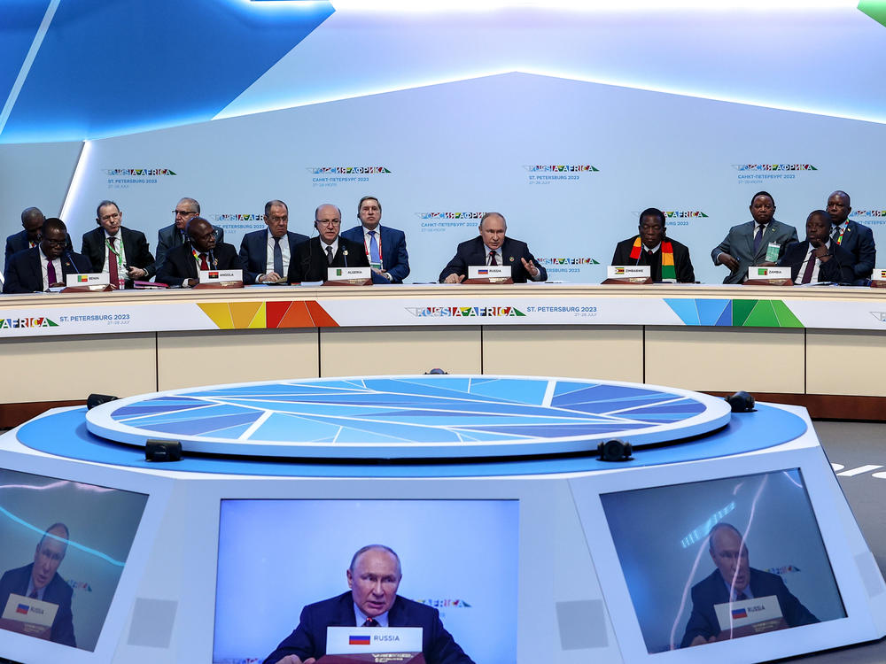 Russian President Vladimir Putin, centre, speaks during a plenary session at the Russia Africa Summit in St. Petersburg, Russia, Friday, July 28, 2023.