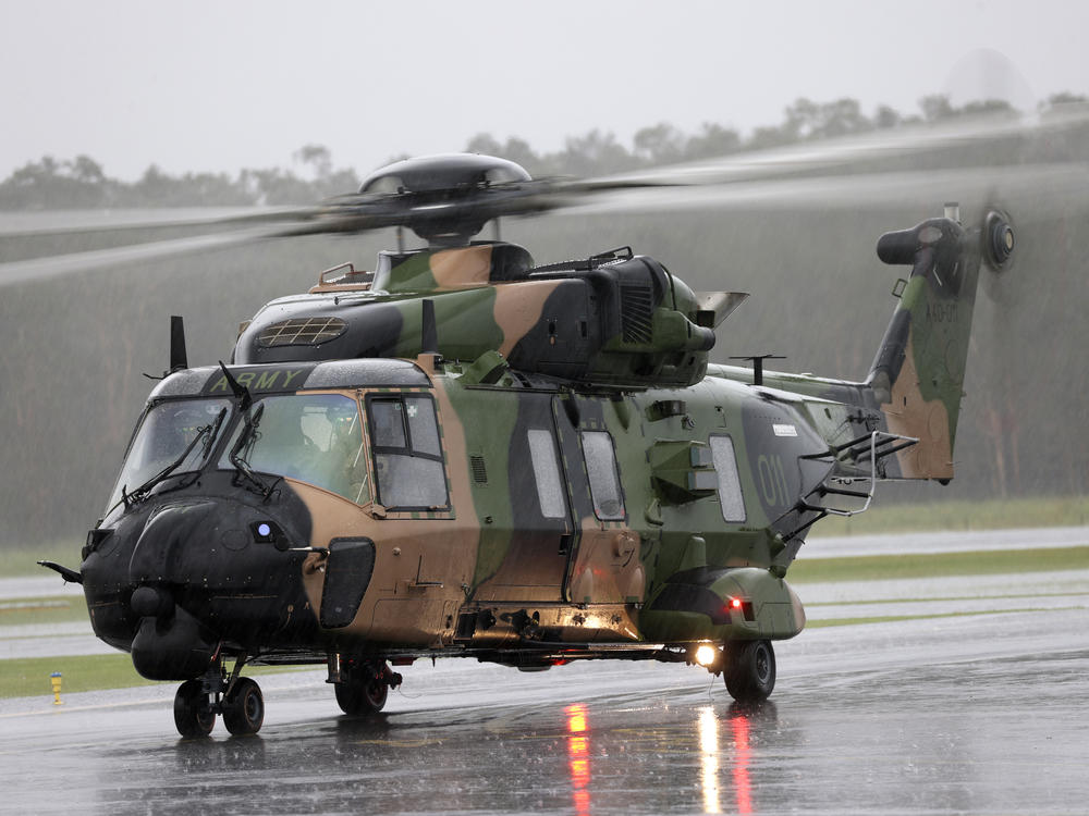 In this photo provided by the Australian Defence Force, an Australian Army MRH-90 Taipan helicopter prepares to take off from Ballina airport, Ballina, Australia, on Feb 27, 2022.