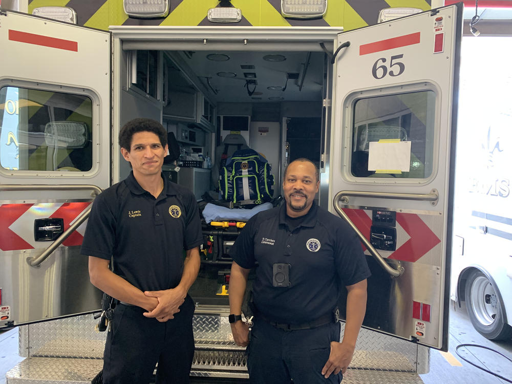 Capt. Janick Lewis and Lt. Titus Carriere of New Orleans Emergency Medical Services at the city's ambulance depot. The newer ambulance units have more powerful air conditioning, which helps cool off patients suffering heat exhaustion or heat stroke.