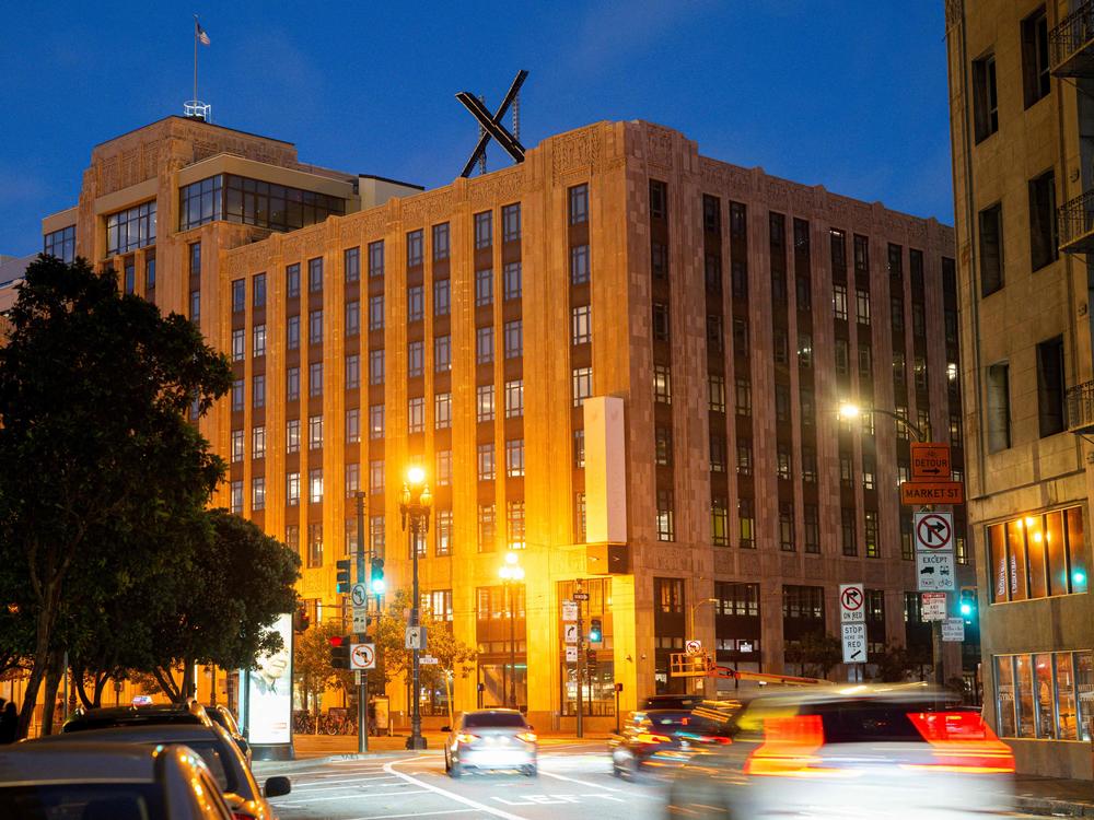 A newly constructed X sign is seen on the roof of the headquarters of the social media platform previously known as Twitter, in San Francisco, on July 29, 2023. Elon Musk killed off the Twitter logo on July 24, 2023, replacing the world-recognized blue bird with a white X. San Francisco city authorities forced the company to take down the sign right away for permitting reasons.