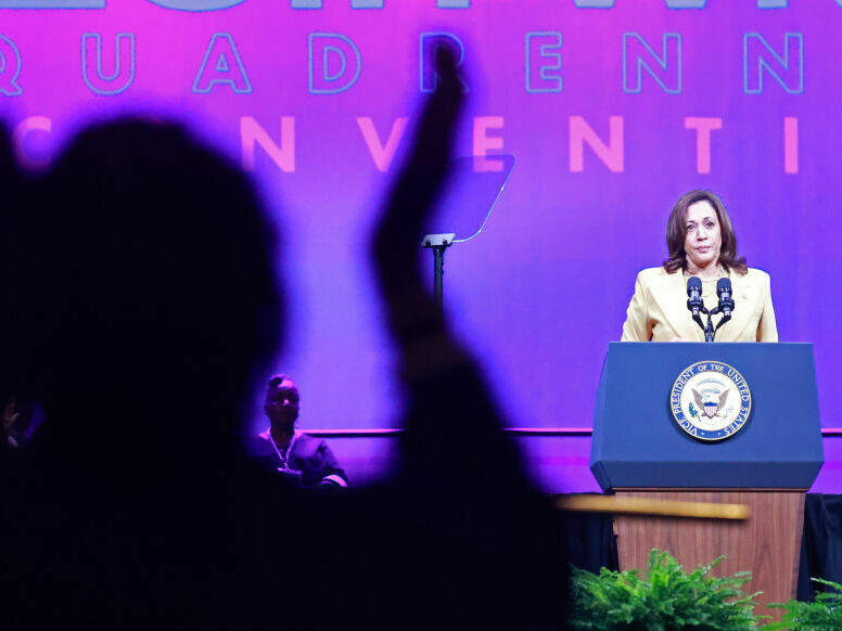 Supporters cheer as Vice President Harris addresses the 20th Quadrennial Convention of the Women's Missionary Society of the African Methodist Episcopal Church on Tuesday in Orlando.