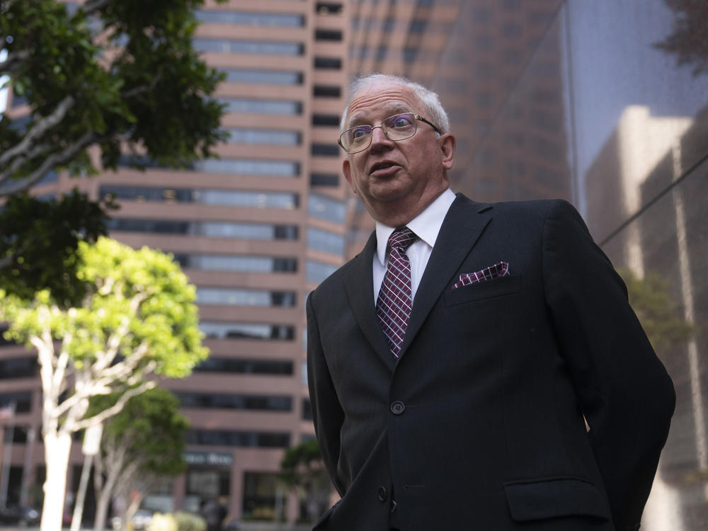 Attorney John Eastman, the architect of a legal strategy aimed at keeping former President Donald Trump in power, talks to reporters after a hearing in Los Angeles, Tuesday, June 20, 2023.