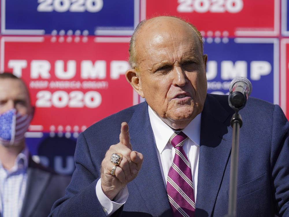 Former New York mayor Rudy Giuliani, a lawyer for President Donald Trump, speaks during a news conference at Four Seasons Total Landscaping on legal challenges to vote counting in Pennsylvania, Nov. 7, 2020, in Philadelphia.