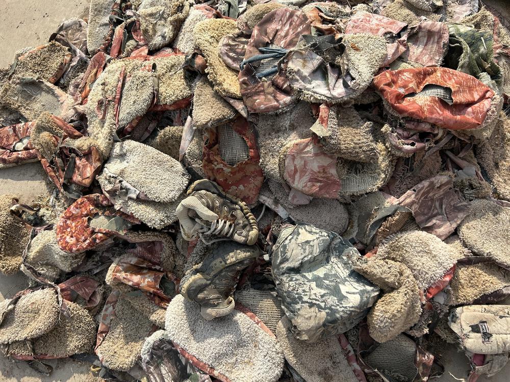 Carpet shoes piled in the driveway of Jim Chilton's house.