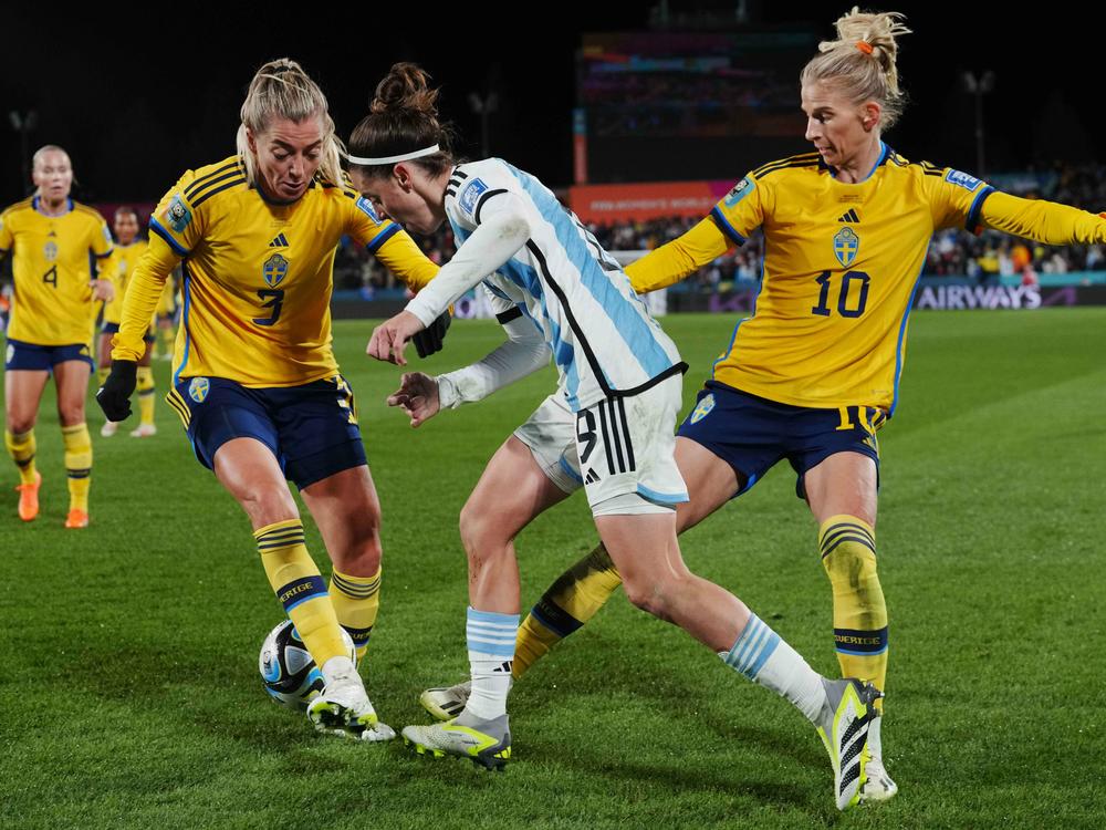 Sweden's Linda Sembrant, left, and Sofia Jakobsson challenge Argentina's Paulina Gramaglia for the ball on Wednesday in Hamilton, New Zealand. Sweden won its group and will face the U.S. in its next match.