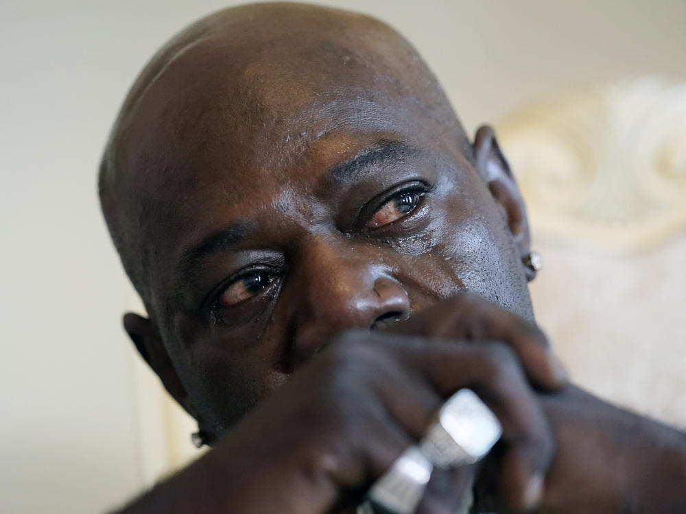 Aaron Bowman cries during an interview at his attorney's office in Monroe, La., on Aug. 5, 2021, as he discusses his injuries resulting from a Louisiana State trooper pummeling him during a traffic stop in 2019.