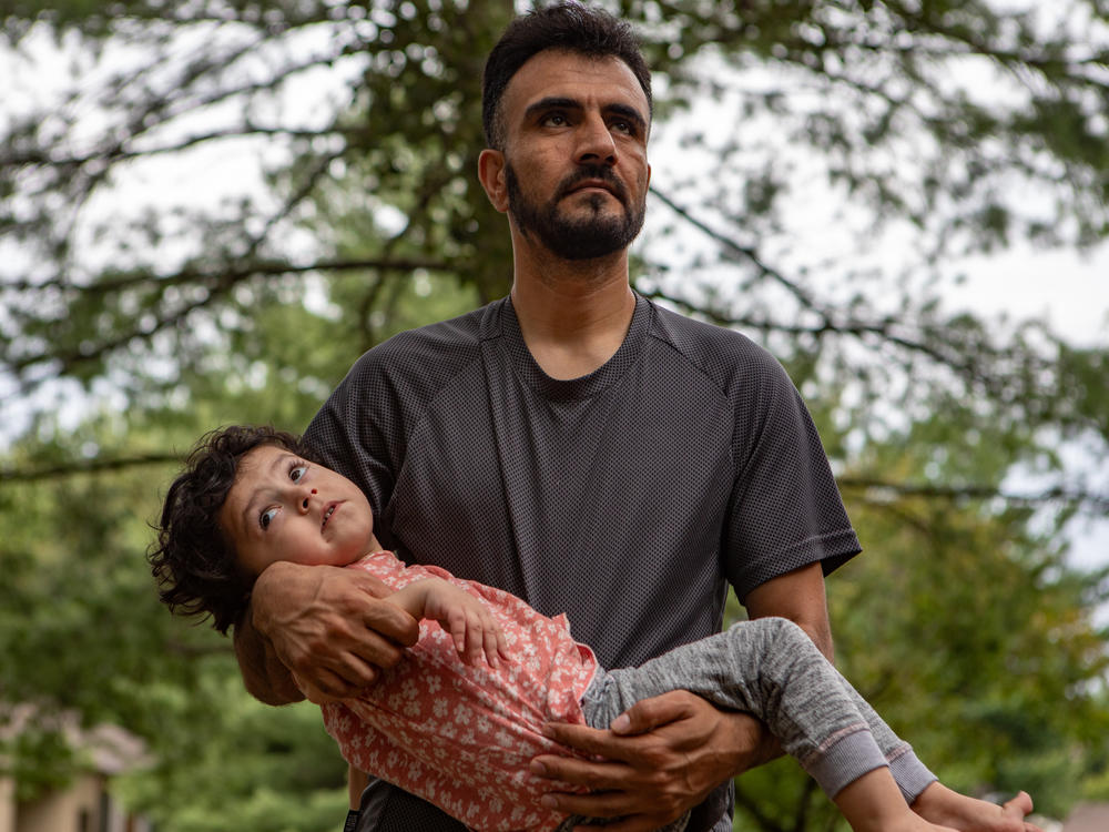 Shafi Amani and his daughter, Yousra, 3, in Alexandria, Va., on Aug. 3, 2023.