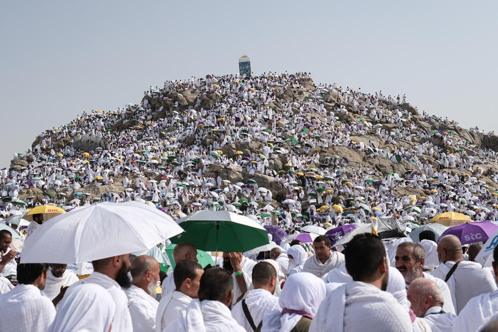 Prospective pilgrims pray at the Jabal ar-Rahmah in Arafat as Muslims continue their worship to fulfill the Hajj pilgrimage in Mecca, Saudi Arabia, on June 27.