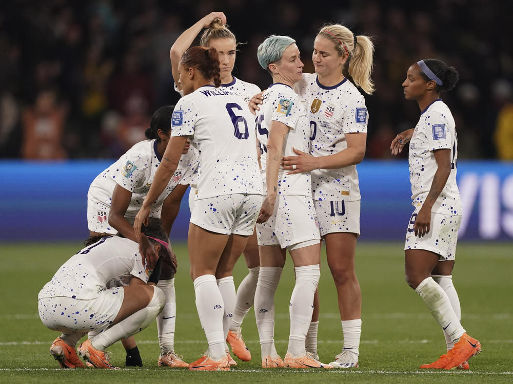 U.S. players react following their loss to Sweden in a penalty shootout during the Women's World Cup round of 16 soccer match in Melbourne, Australia, Sunday, Aug. 6, 2023.