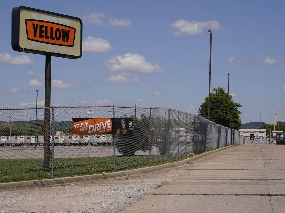 A sign for Yellow Corp. trucking company stands outside its facility Monday, July 31, 2023 in Nashville, Tenn. Trucking company Yellow Corp. has declared bankruptcy after years of financial struggles and growing debt, marking a significant shift for the U.S. transportation industry and shippers nationwide.