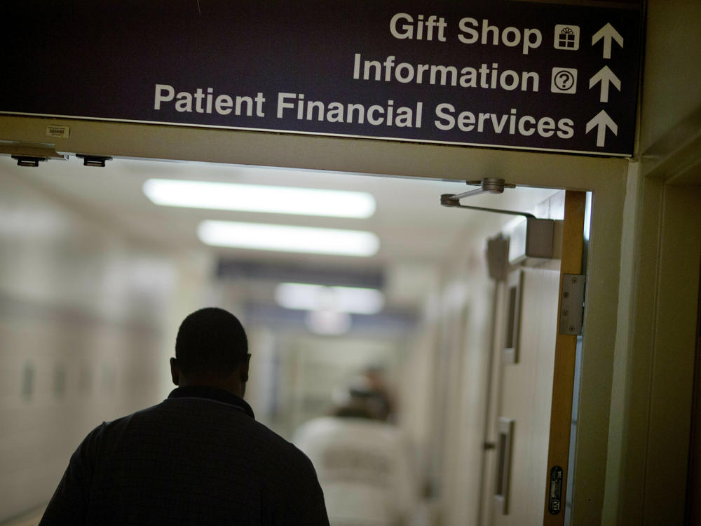 A sign points visitors toward the financial services department at Grady Memorial Hospital, in Atlanta.