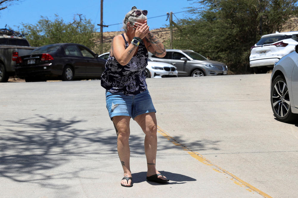 August 9: After hearing reports her home was destroyed along with her pets, Steff Baku-Kirkman reacts after wildfires driven by high winds were believed to have destroyed much of the historic town of Lahaina.