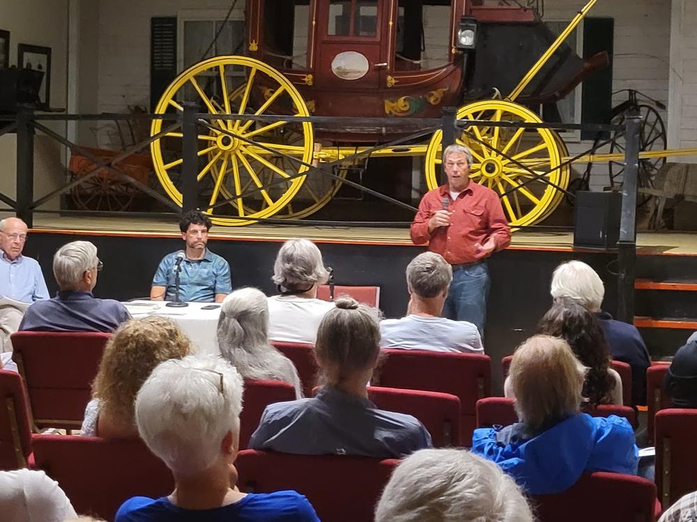 Local government leader Gerry Delaney speaks at a community meeting in the Adirondack Park.  Part of his message:  