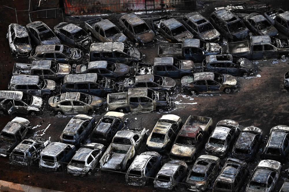 August 10: Destroyed cars show a part of the damage in Lahaina.