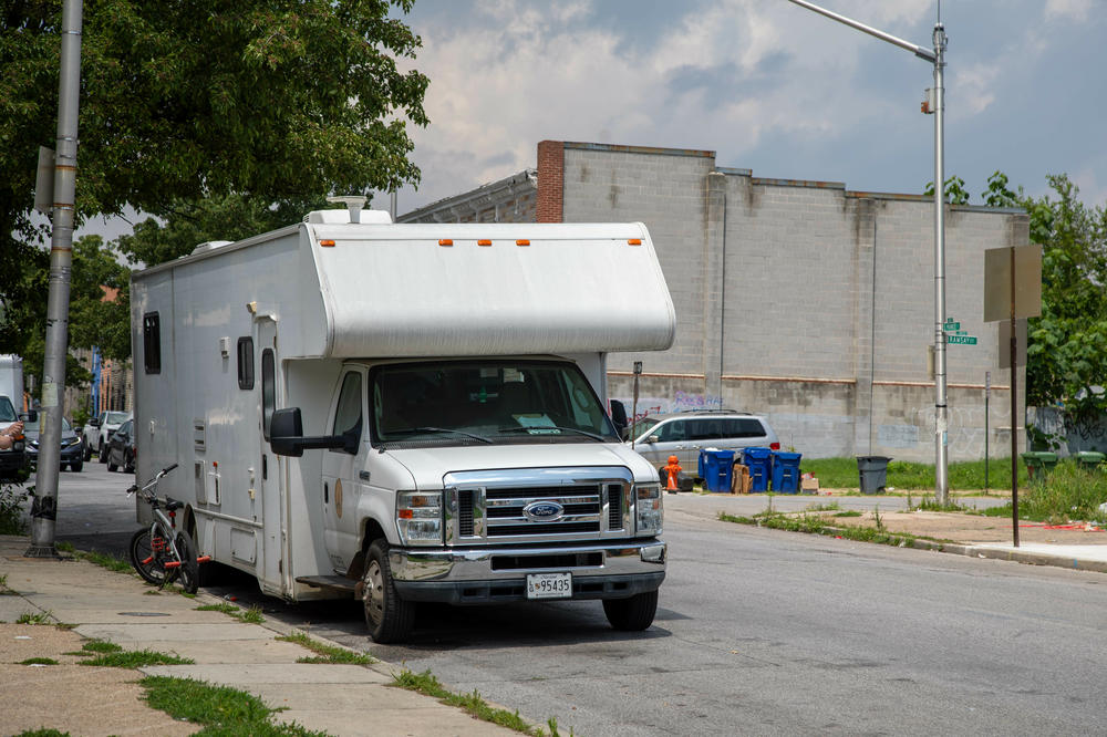 A harm reduction van  is parked in the Carrollton Ridge neighborhood of Baltimore. The van provides a place for people to exchange used needles for clean needles.