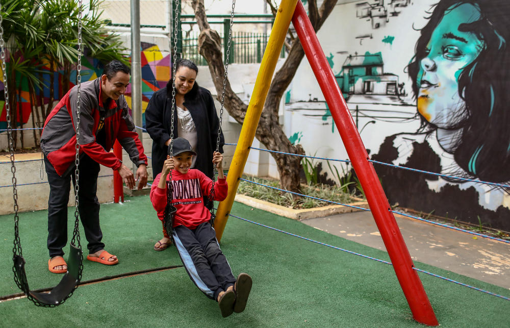 When school is done for the day, 9-year-old Henrique enjoys playing at the playground at Vila Reencontro, a project that provides a home for those who'd lose their housing. 
