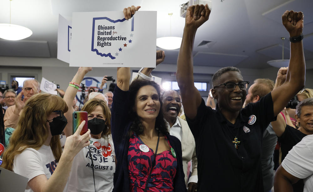 People celebrate the defeat of Issue 1 during a watch party Tuesday in Columbus, Ohio.