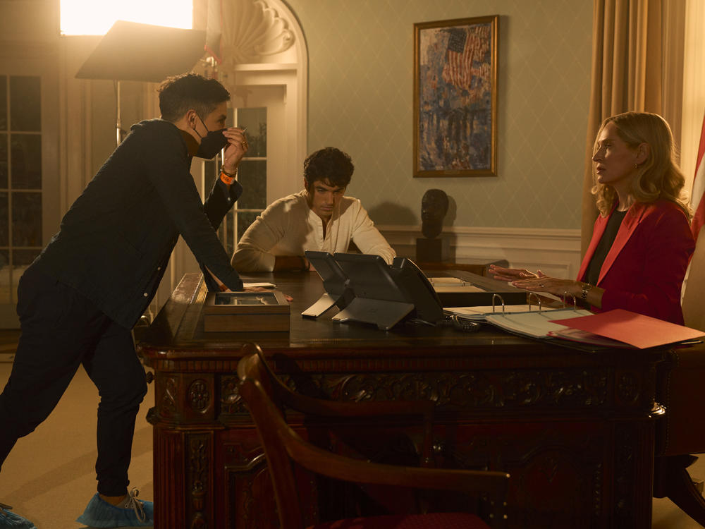 Matthew López (left) on the set of his new movie, <em>Red, White & Royal Blue</em>.