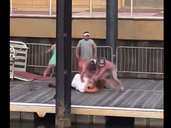 A screenshot from one of the videos of the brawl in Montgomery, Ala., on Saturday. The video shows a fight that broke out between a boat co-captain and several men who appeared to be parking their pontoon boat in a space reserved for the city's riverboat.