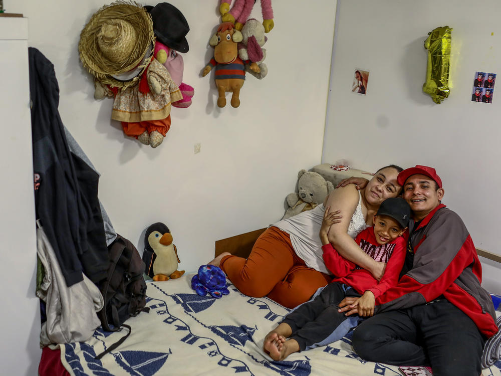 Erica Lacerda de Souza, Bruce Lee Sousa and son Henrique of São Paulo, Brazil, lost their home during the pandemic but got a fresh start from a program that offers tiny houses to homeless people. At first they said no — it seemed too good to be true.