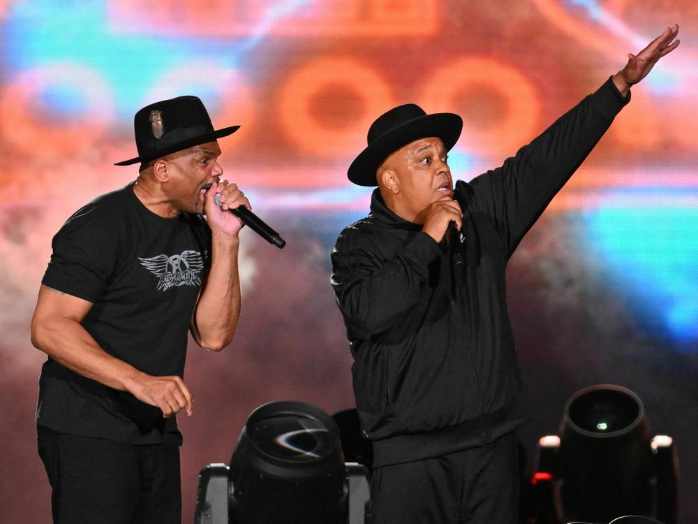 Darryl McDaniels (L) and Joseph Simmons (R) of Run-DMC, closing the Hip Hop 50 Live concert at Yankee Stadium in the Bronx, N.Y. early Saturday morning.