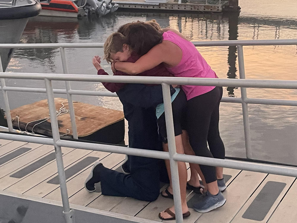 Four divers were reunited with their relieved families and friends early Monday — one day after they went missing in the Atlantic Ocean.