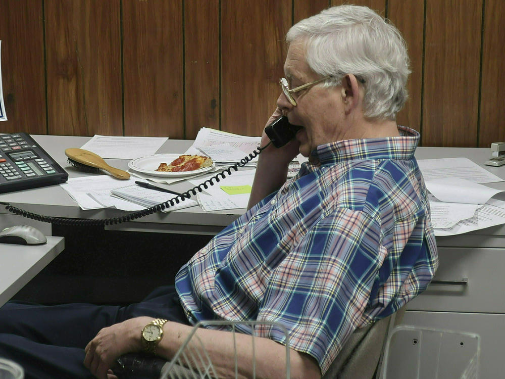 Eric Meyer, publisher of the Marion County (Kansas) Record, shown speaking with a British radio station about the raid on his newspaper's offices and his home by local police.