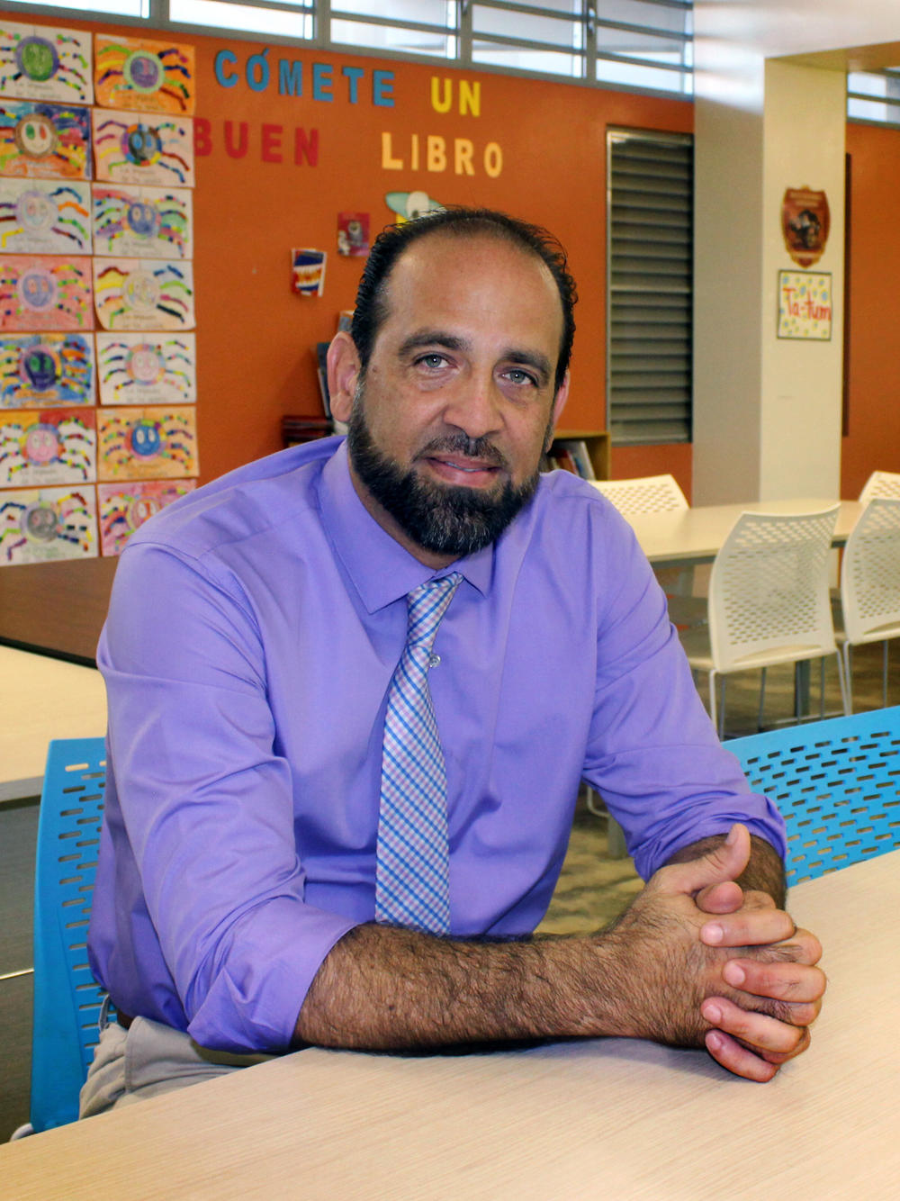 Principal Jorge Luis Colón González leads Deishangelxa's school, El Coquí, where a new, federally funded after-school tutoring program aims to help students recover from learning setbacks.