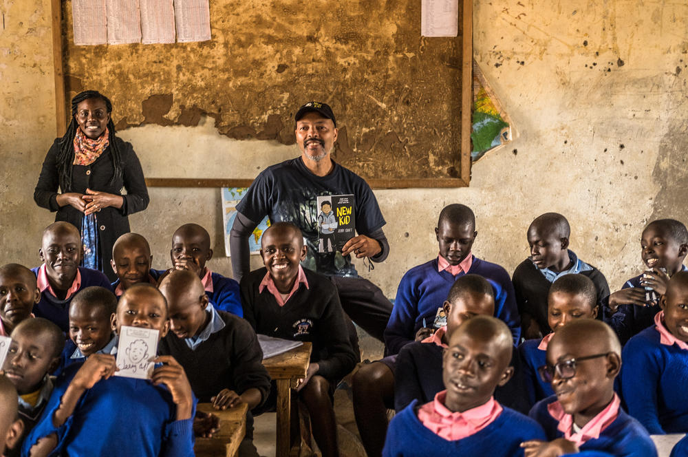 Award-winning children's book author and illustrator Jerry Craft chats with students at Nyaani Primary School in Machakos County, Kenya, on July 4. 