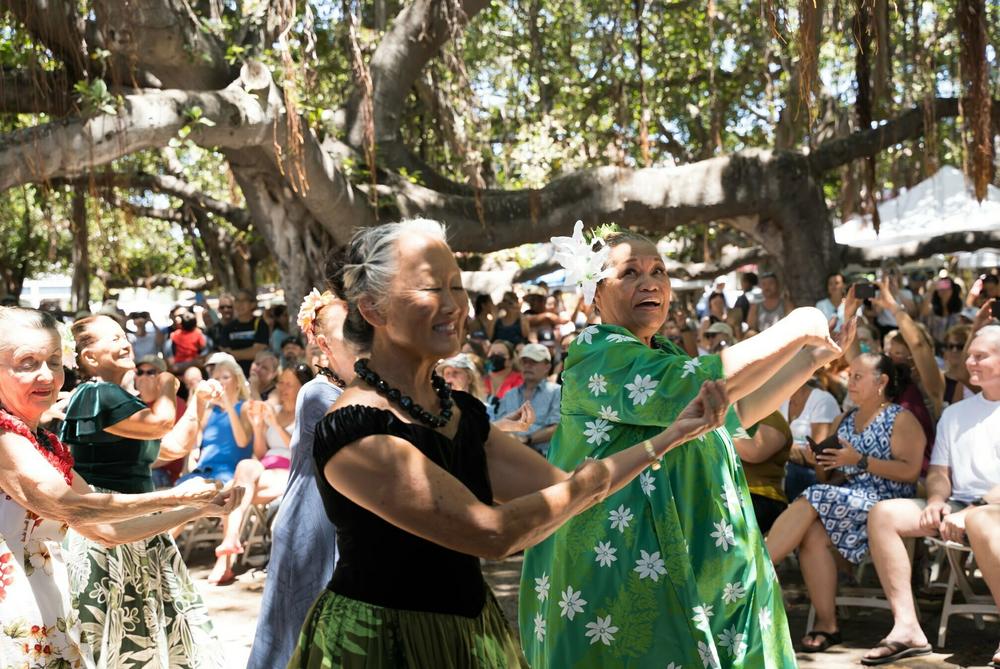 A scene from the 2022 Emma Farden Sharpe Hula Festival, which usually takes place under the famous banyan tree in downtown Lahaina. The organizers pivoted to Facebook for the 2023 edition after the fires badly burned the tree.