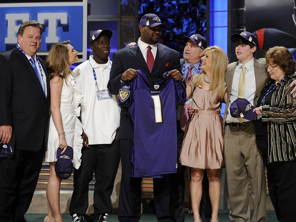 Members of the Tuohy family are speaking out after former NFL player Michael Oher alleged that they earned millions from pushing a false narrative that they adopted him. Here, Oher poses for a photograph with the Tuohy family at Radio City Music Hall for the 2009 NFL Draft on April 25, 2009 in New York City.