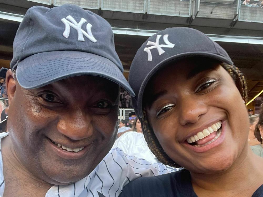 Taylor Evans at a Yankee game in New York with her dad.