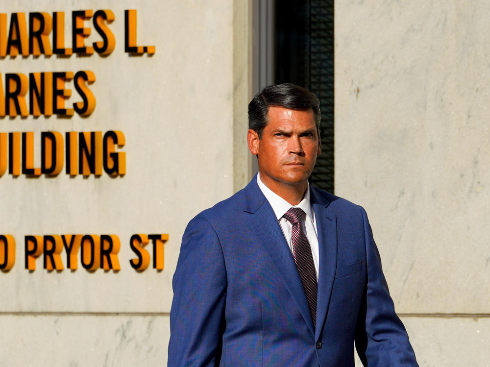 Geoff Duncan, former Georgia Lieutenant Governor, walks outside the Fulton County Courthouse in Atlanta on Monday, Aug. 14, 2023.
