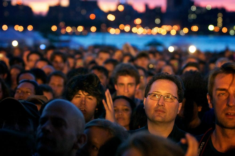 Fans face away from the Manhattan skyline during sunset at Sonic Youth's Williamsburg Waterfront show. 