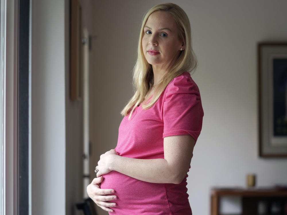 Dr. Austin Dennard at her home in Dallas in May. She is one of 13 patients and two other doctors suing Texas over its abortion bans.