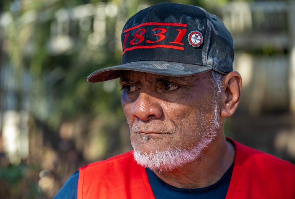 Keeamoku Kapu runs the Na 'Aikane o Maui Cultural and Research Center which was burned to the ground in the wildfires so he helped set up this grassroots community distribution center in Lahaina.